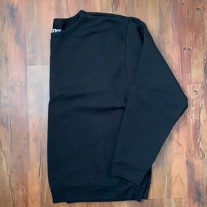 Black crewneck sweatshirt